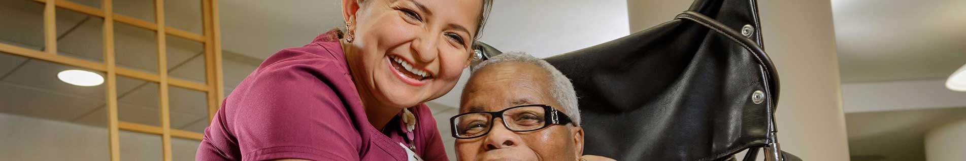 resident with a staff member